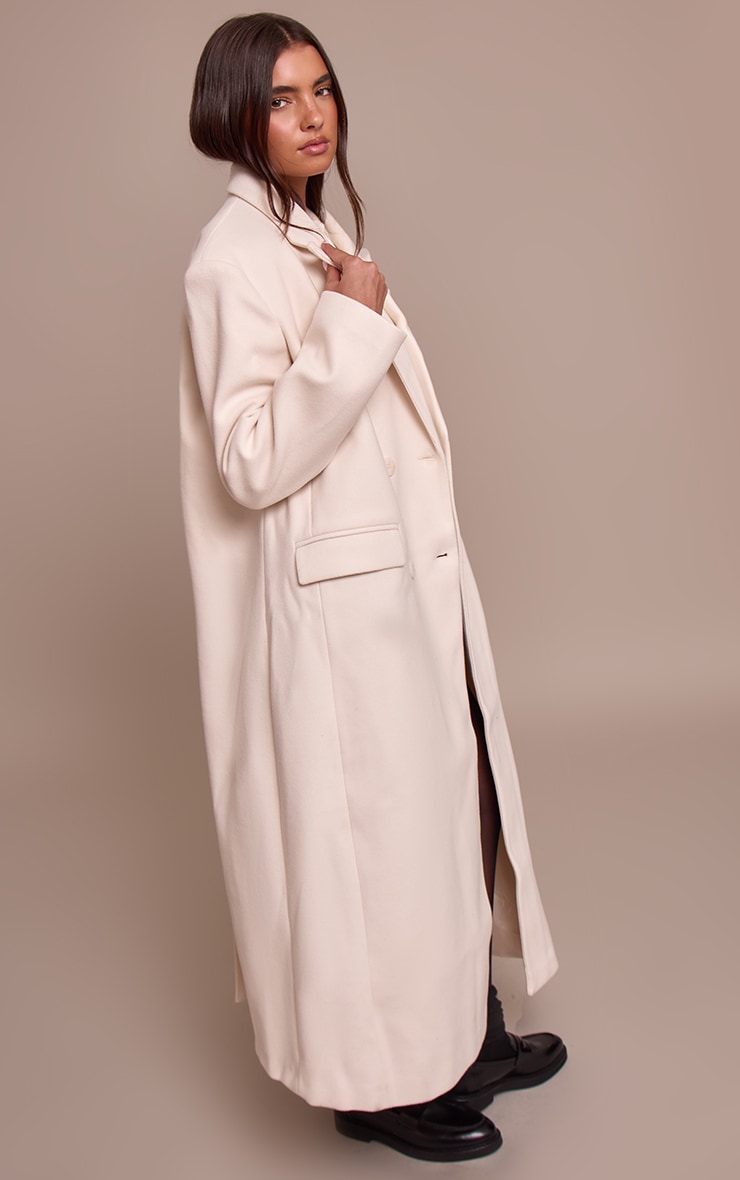 Manteau structuré oversize écru à double boutonnière image 3