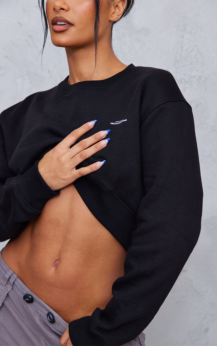 PRETTYLITTLETHING Black Crop Rib Hem Washed Sweatshirt image 4