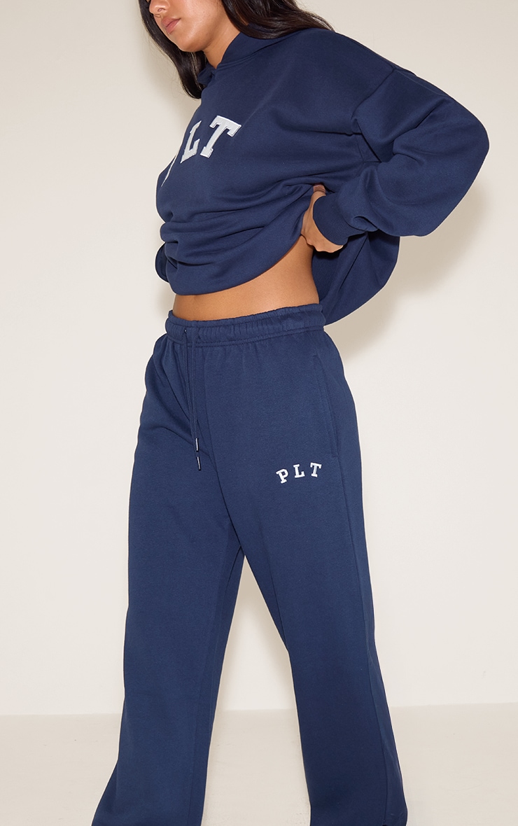 PRETTYLITTLETHING Navy Logo Oversize Wide Leg Track Pants image 1