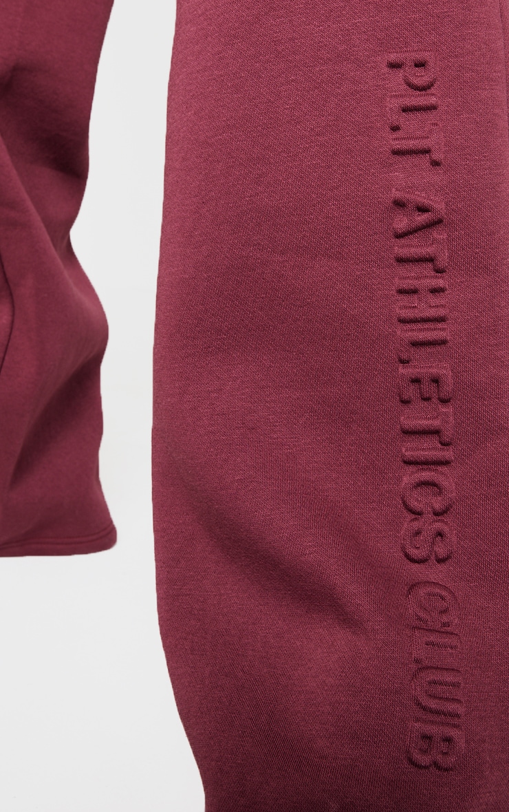 PRETTYLITTLETHING Burgundy Athletics Club Embossed Straight Leg Track Pants image 4