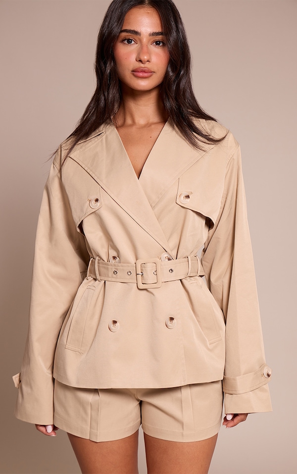 Petite Trench mi-long beige à taille cintrée