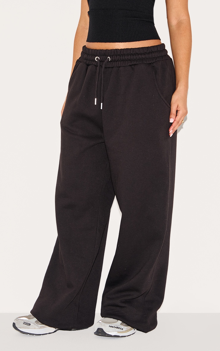 Petite Jogging large noir à taille élastique et cordons ajustables image 1