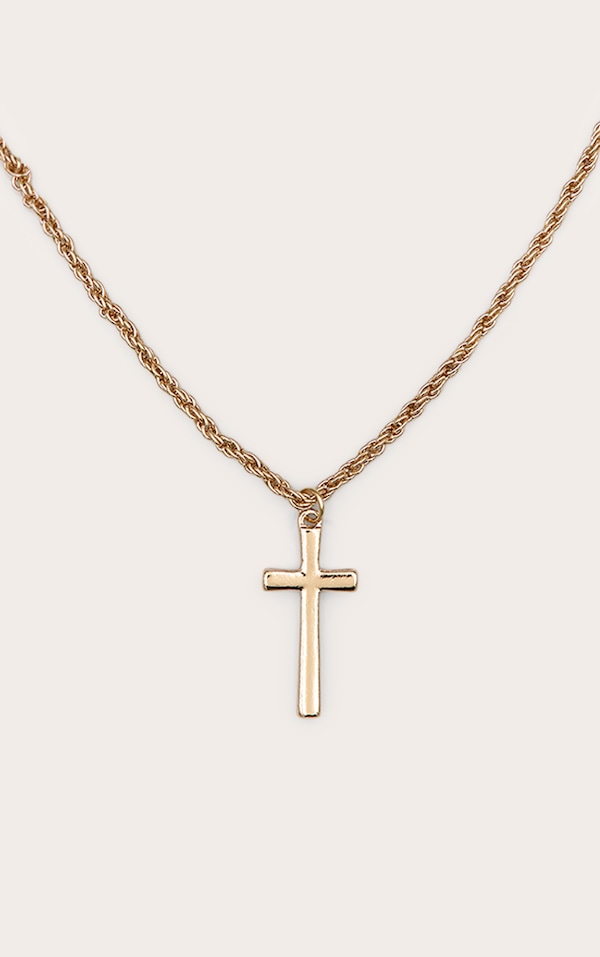 Collier doré à grosse chaîne et pendentif croix