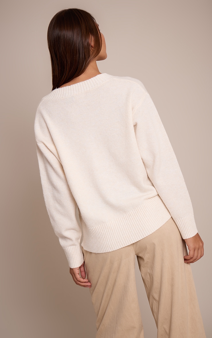 Pull en maille tricot crème à col en V image 2