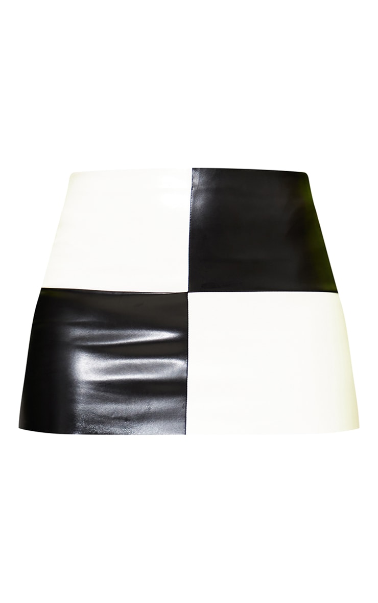 Black and white checkered sales skirt 7 little words