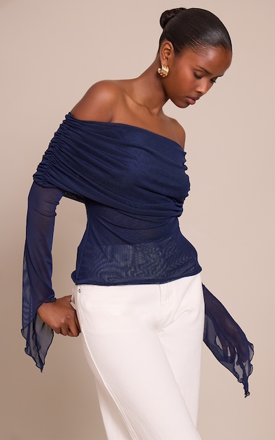 Top en mesh bleu marine à col replié et manches exagérées