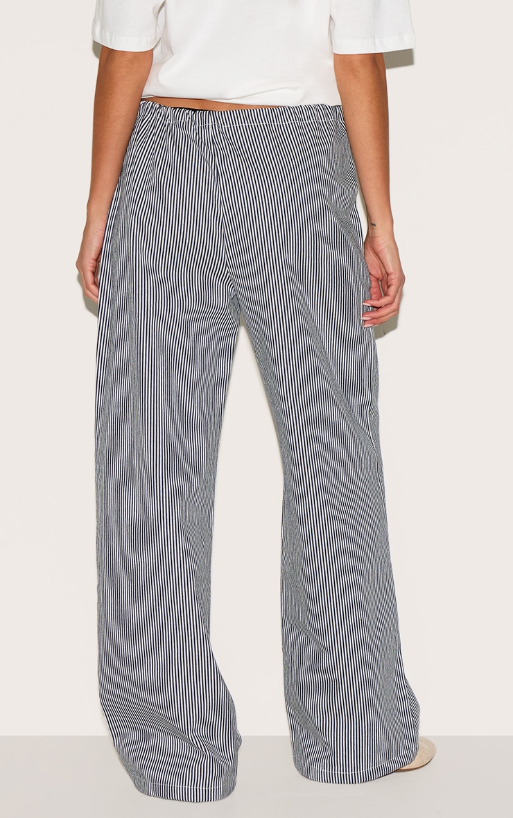 Pantalon en jean bleu à fines rayures et taille mi-haute nouée image 3