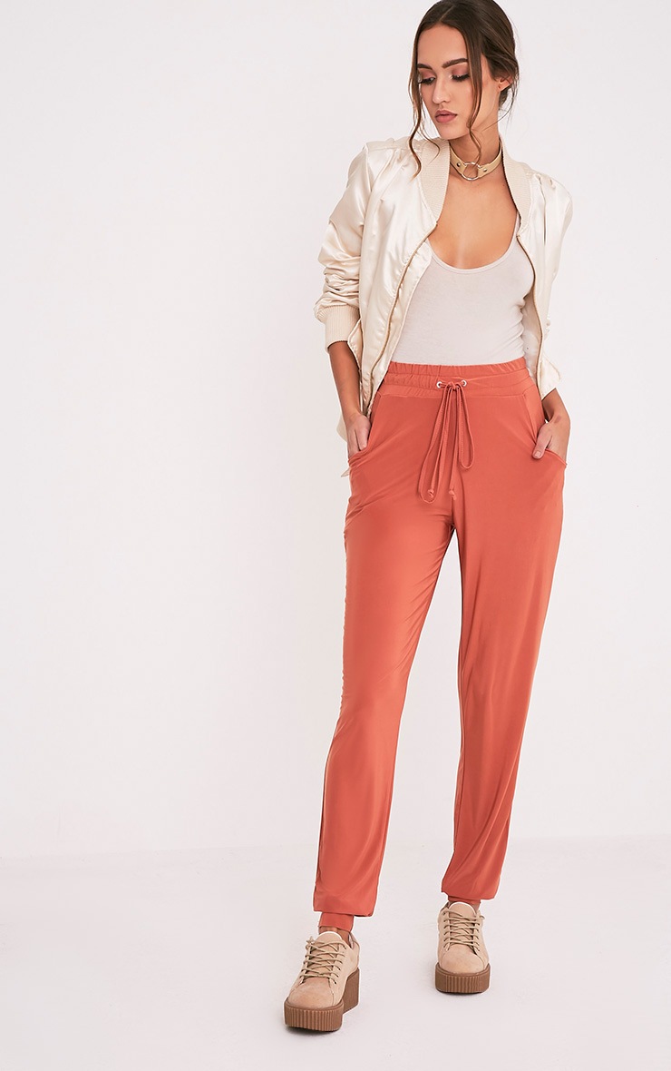 Savanna Deep Peach Slinky Joggers Trousers PrettylittleThing