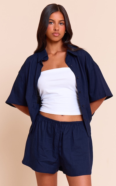 Petite Chemise en effet lin bleu marine à manches courtes