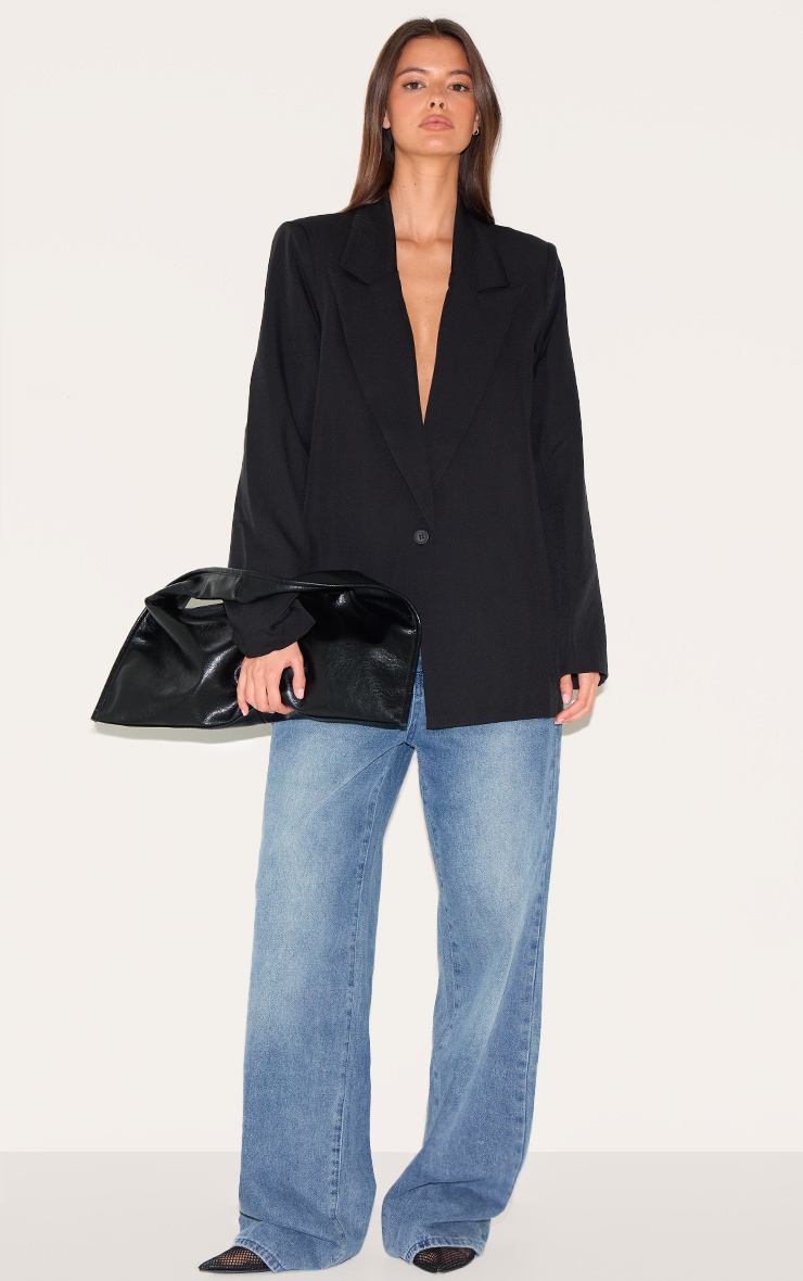 Blazer oversize noir à détail bouton image 3