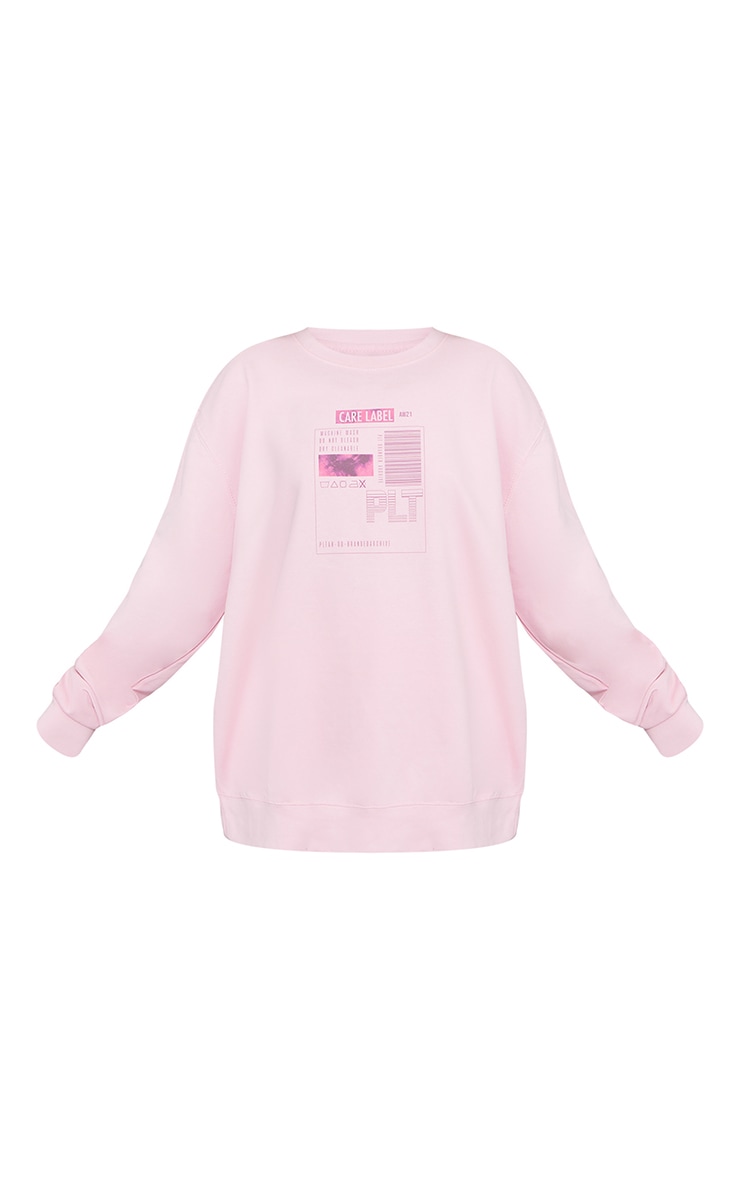 PRETTYLITTLETHING Sweat oversize rose à imprimé Care Label image 5