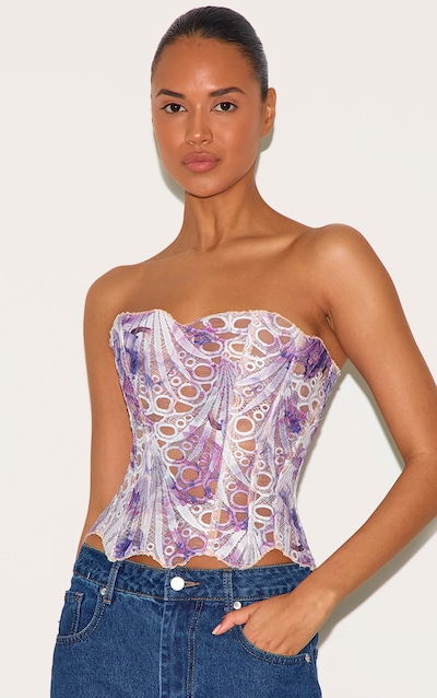 Corset en dentelle texturée bleue transparente fleurie