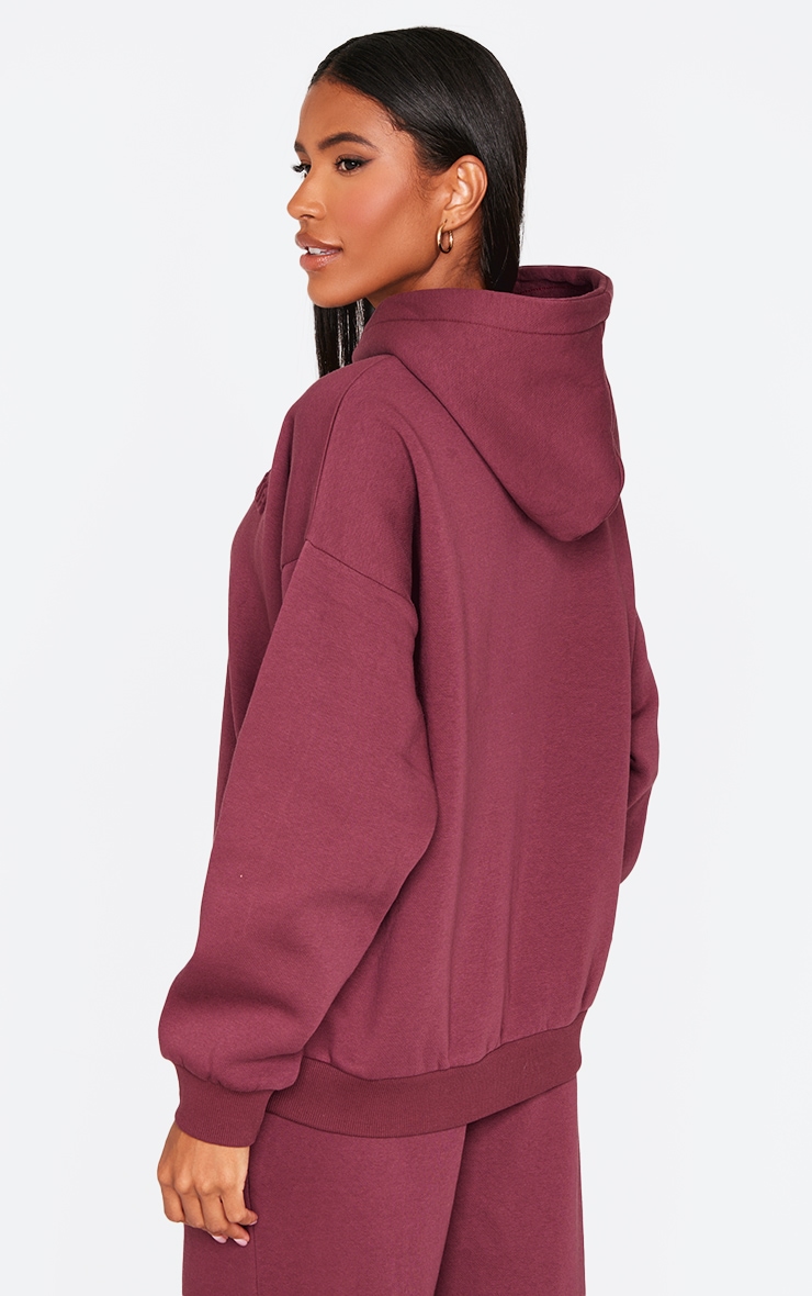 PRETTYLITTLETHING Burgundy Athletics Club Embossed Graphic Oversized Hoodie image 2