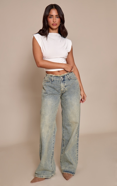 Petite Jean droit bleu vintage délavé à taille basse effilochée