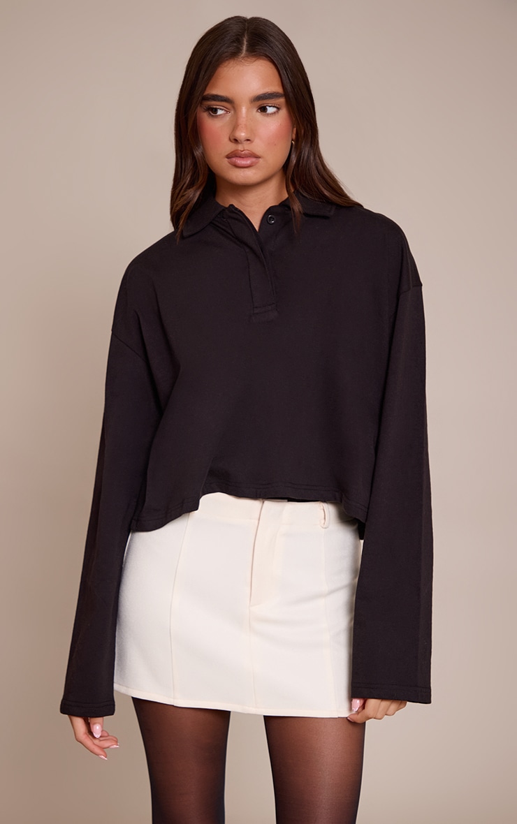 Femme Crop top en coton noir a col polo et manches longues |