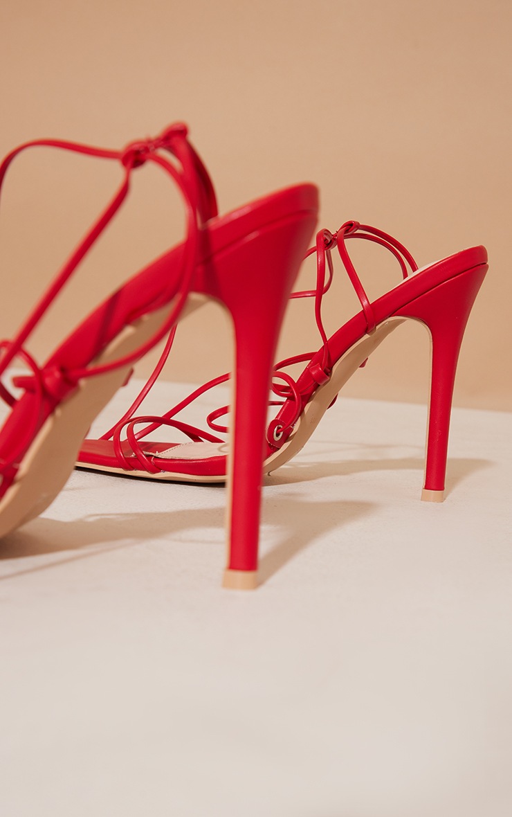 red pointed open toe heels