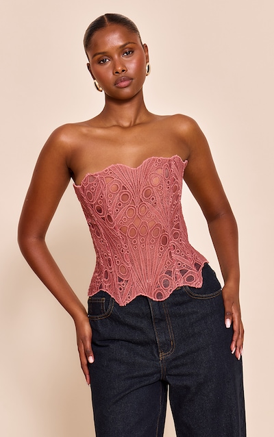 Corset en dentelle texturée vieux rose transparente fleurie