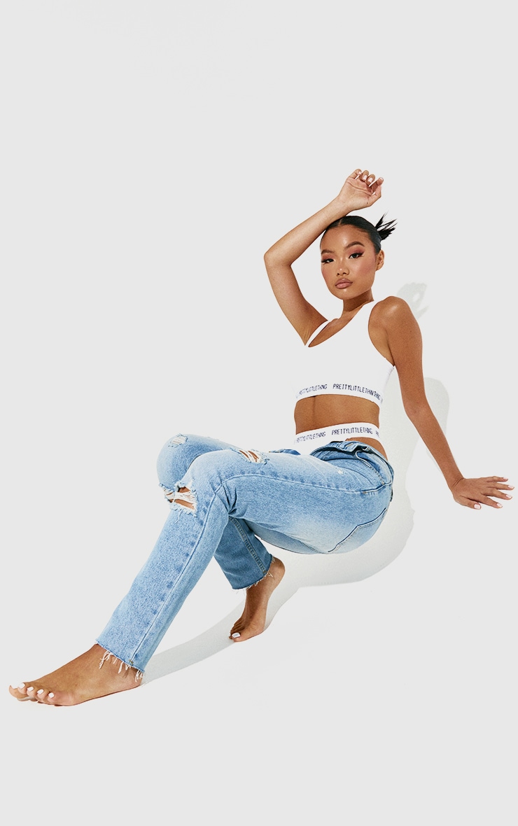 Petite Light Wash Distressed Mom Jeans