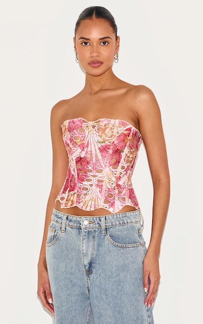 Corset en dentelle texturée rose transparente fleurie