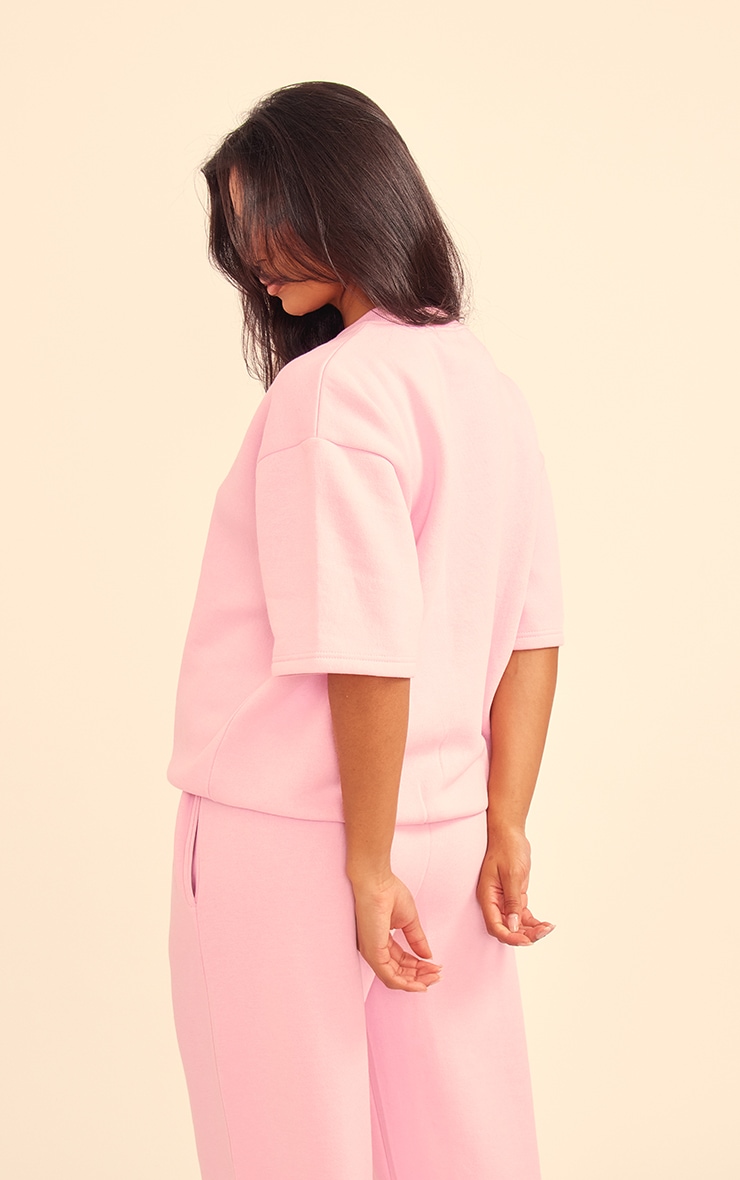 PRETTYLITTLETHING Baby Pink Badge Detail Oversized Short Sleeve Sweatshirt image 2
