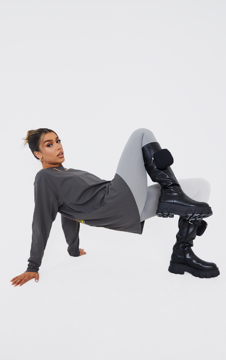 Bottes noires crantées à poche