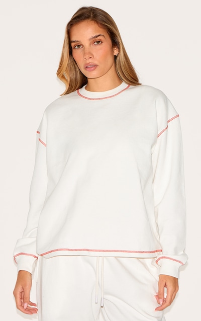 Sweat crème à doublure en polaire et coutures contrastantes