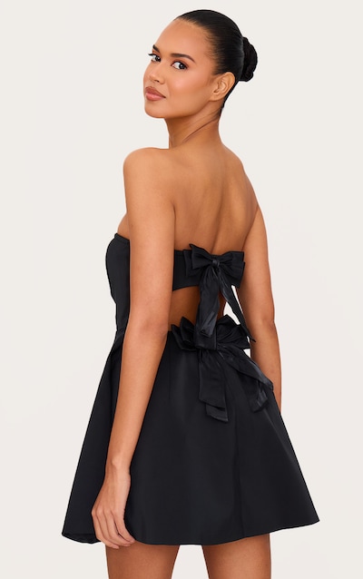 Mini robe droite noire à dos nu et noeud