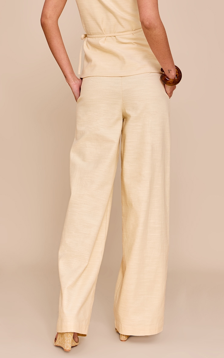 Pantalon large texturé amande plissé à taille mi-haute image 3