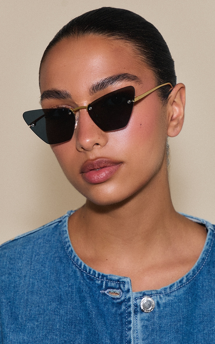 Gold Exaggerated Cat Eye Sunglasses image 1