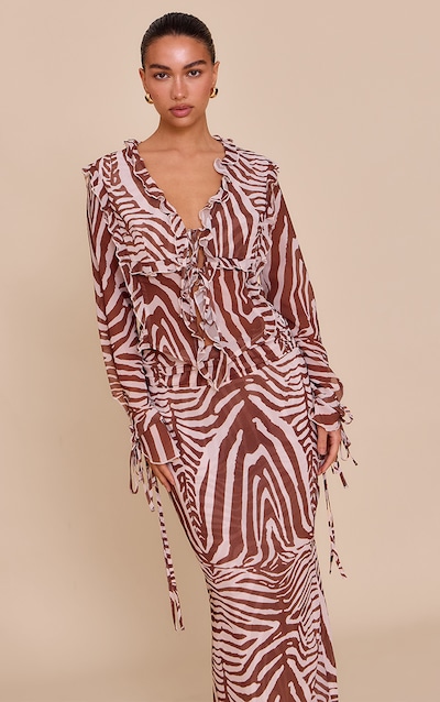 Blouse à imprimé zèbre marron en mousseline de soie avec volants et lien à nouer sur le devant