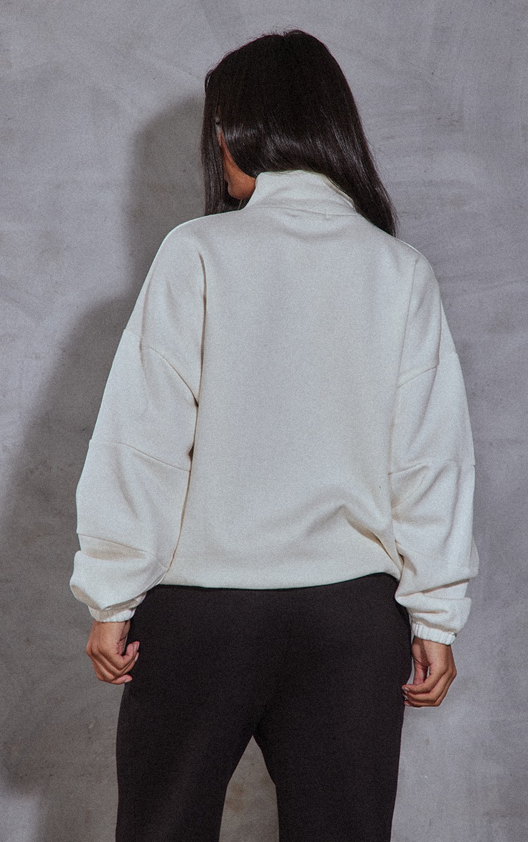 oversized cream sweatshirt