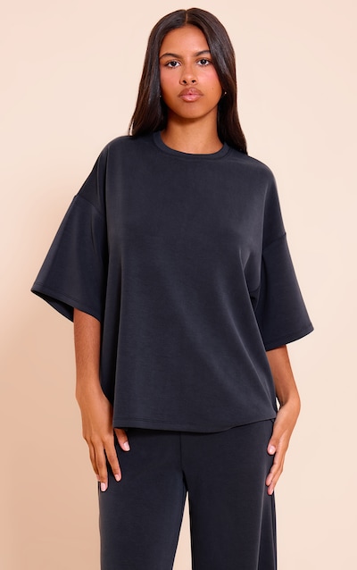 Petite Top oversize modal noir à manches courtes