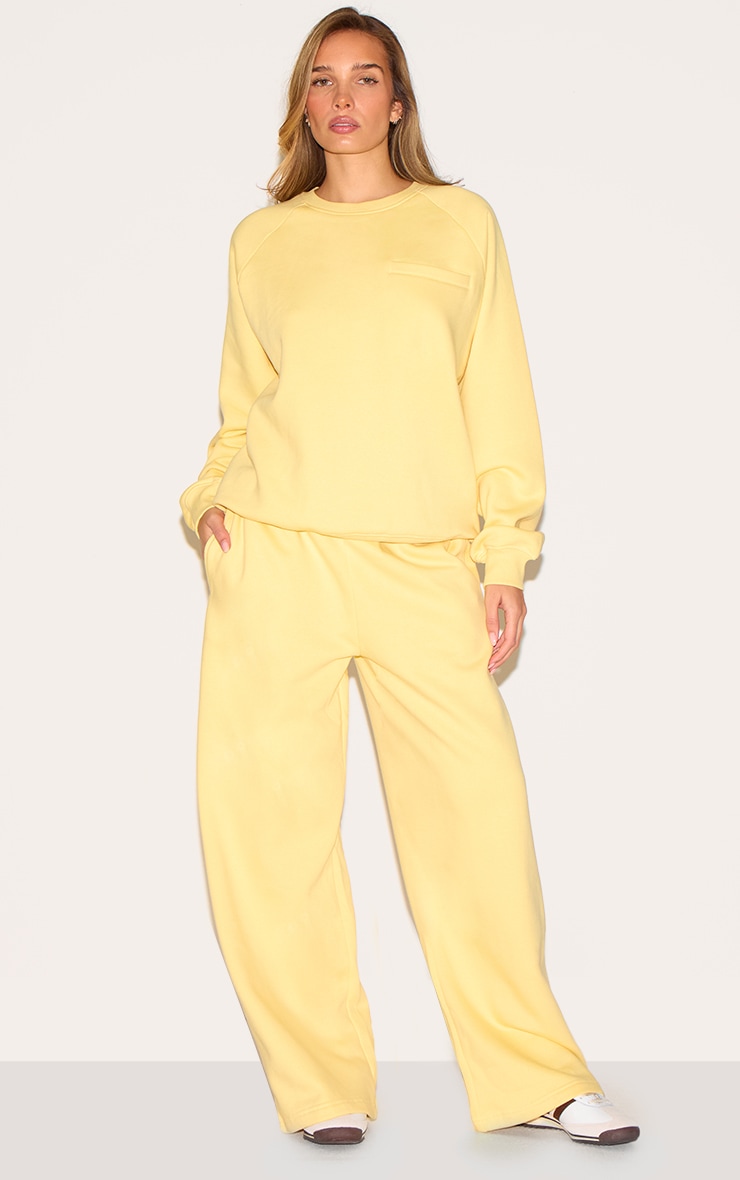 Butter Yellow Oversized Pocket Detail Sweatshirt | Sweat |  PrettyLittleThing CA