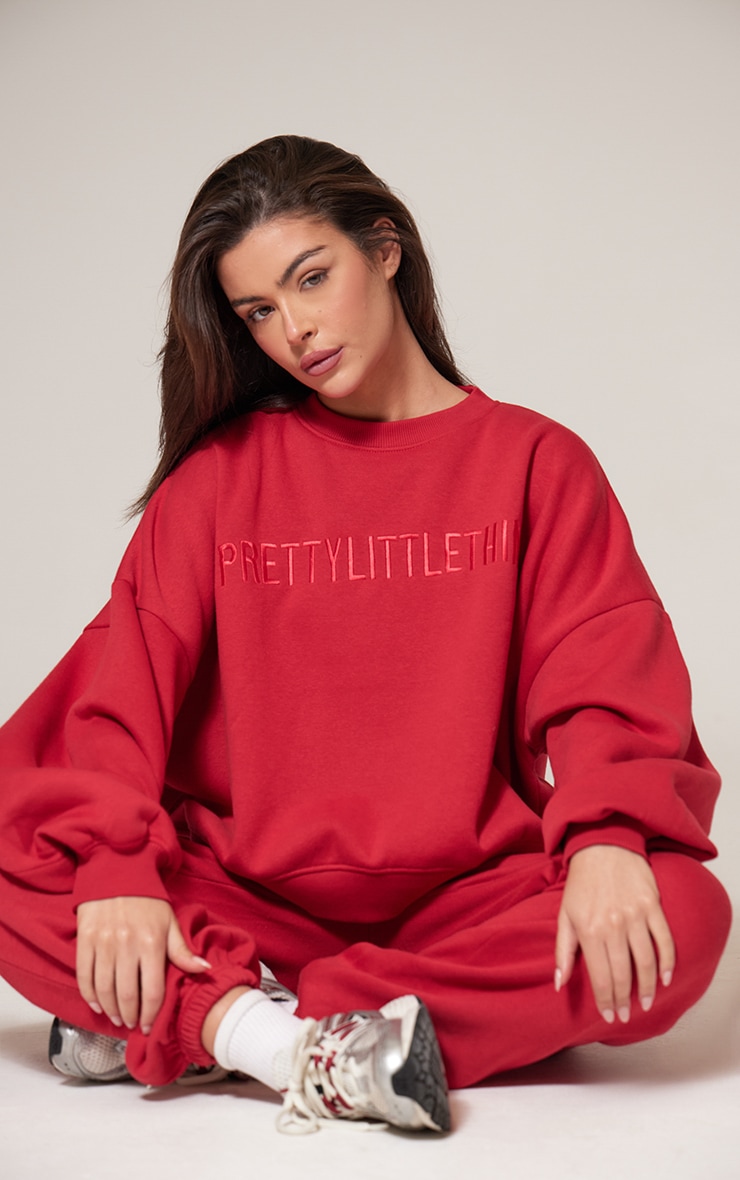 PRETTYLITTLETHING Red Boxy Embroidered Sweatshirt image 1