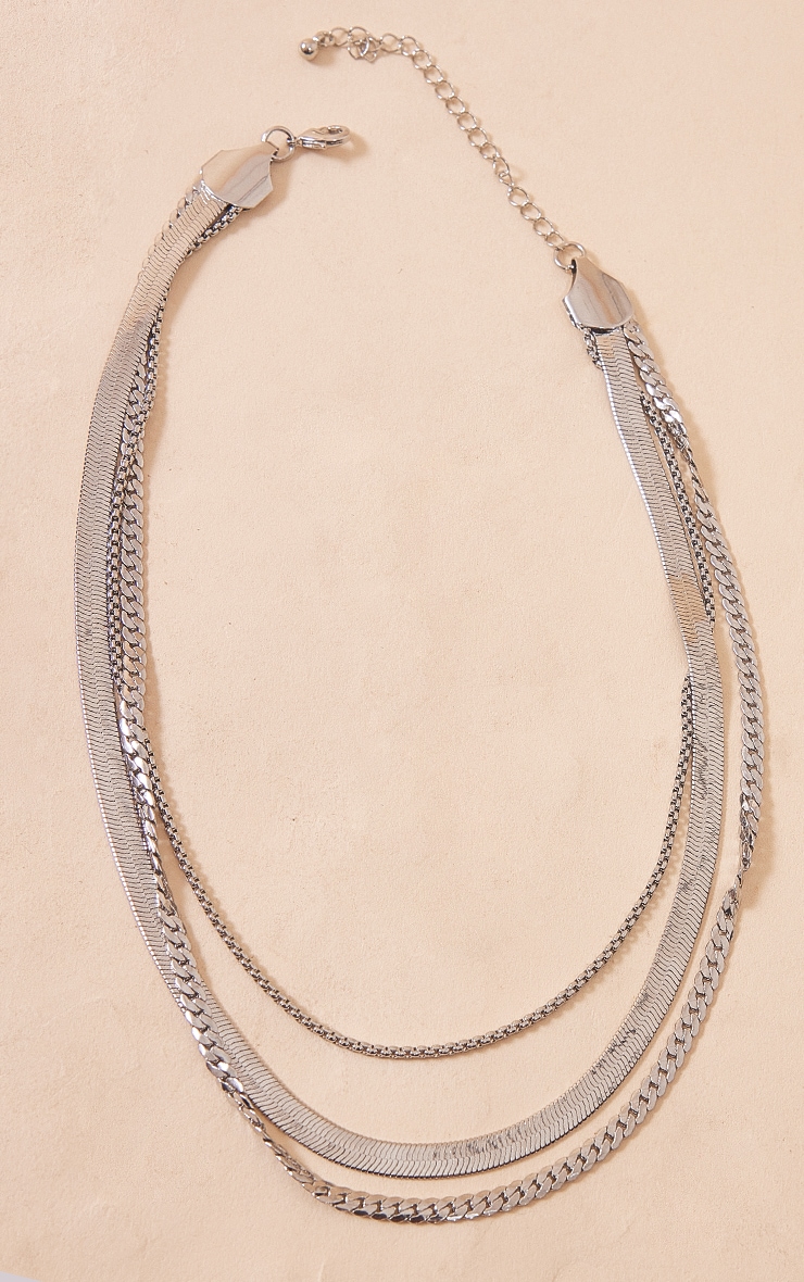 COLLIER CHAÎNE EN os serpent avec un arc tendance parfait pour toutes