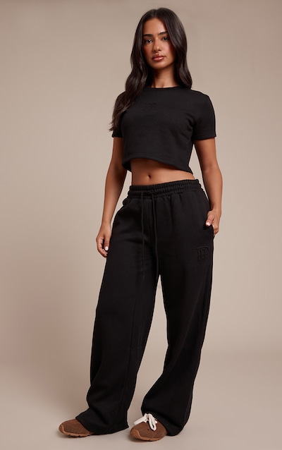 Petite Jogging large noir à cordons ajustables et logo PrettyLittleThing