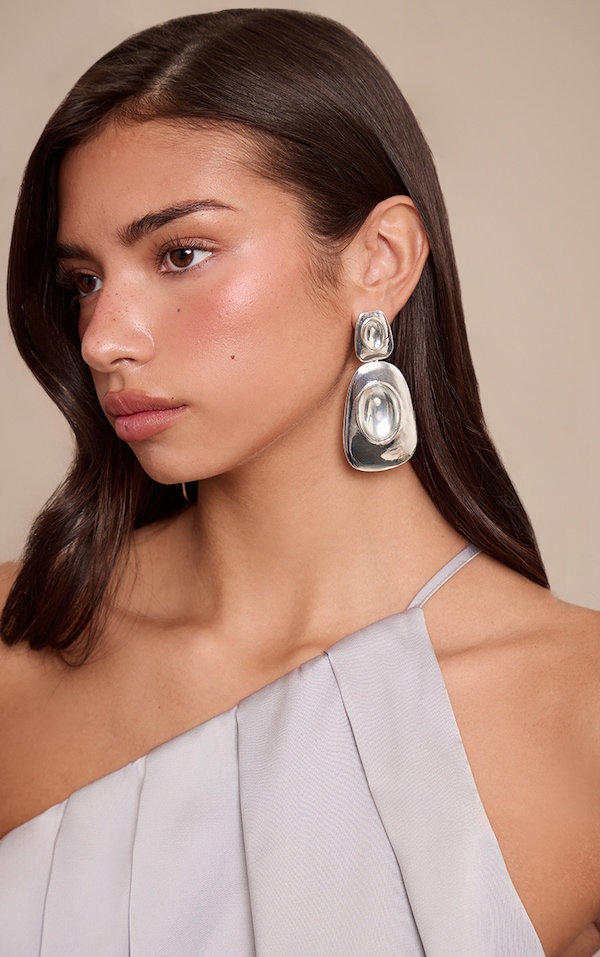 Boucles d'oreilles superposées lisses argentées à pierres transparentes