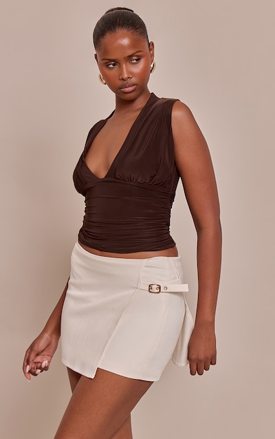 Mini-jupe tissée crème à détail ceinture