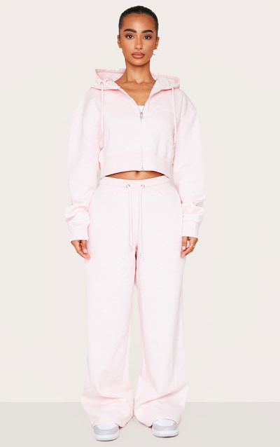Petite Jogging large rose tendre à taille nouée et détail en relief
