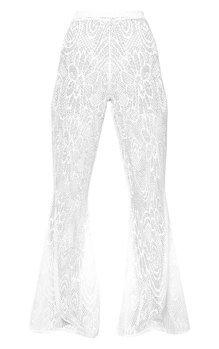white flare beach trousers