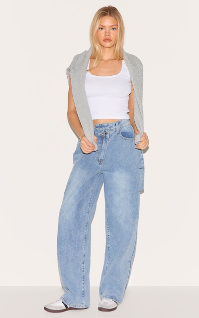 Jean boyfriend baggy bleu clair délavé à taille basse asymétrique et cuisses fendues