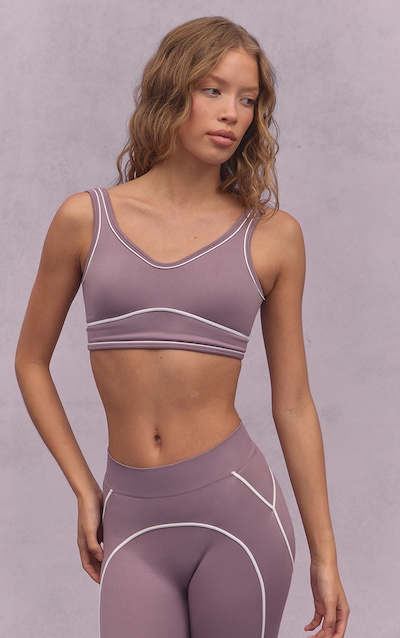 Brassière de sport mauve sans coutures à détails contrastés