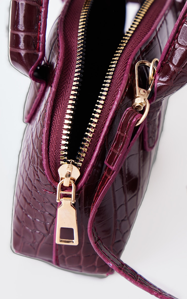 burgundy croc bag