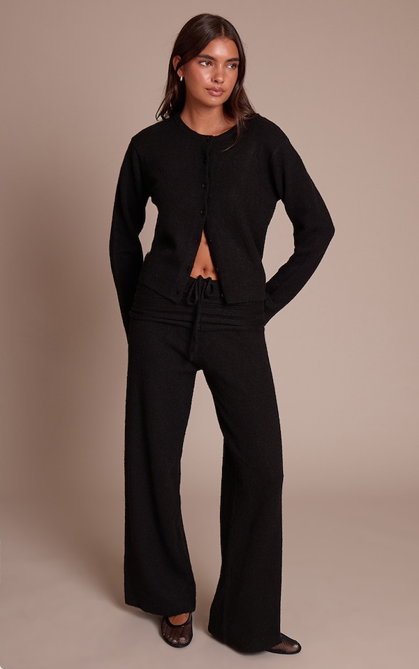 Pantalon en maille tricot douce côtelée noire à taille repliée