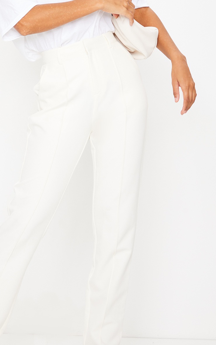 cream cigarette trousers