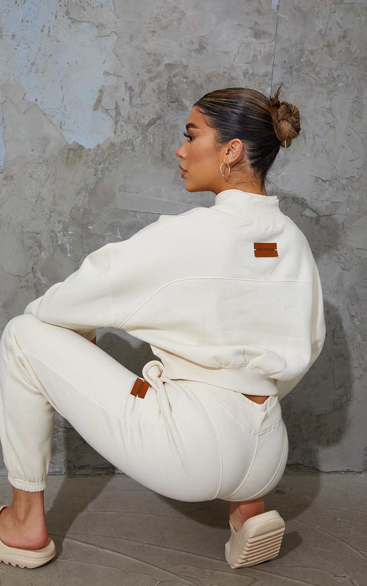 PRETTYLITTLETHING Oatmeal Badge Back Detail Crop Sweater