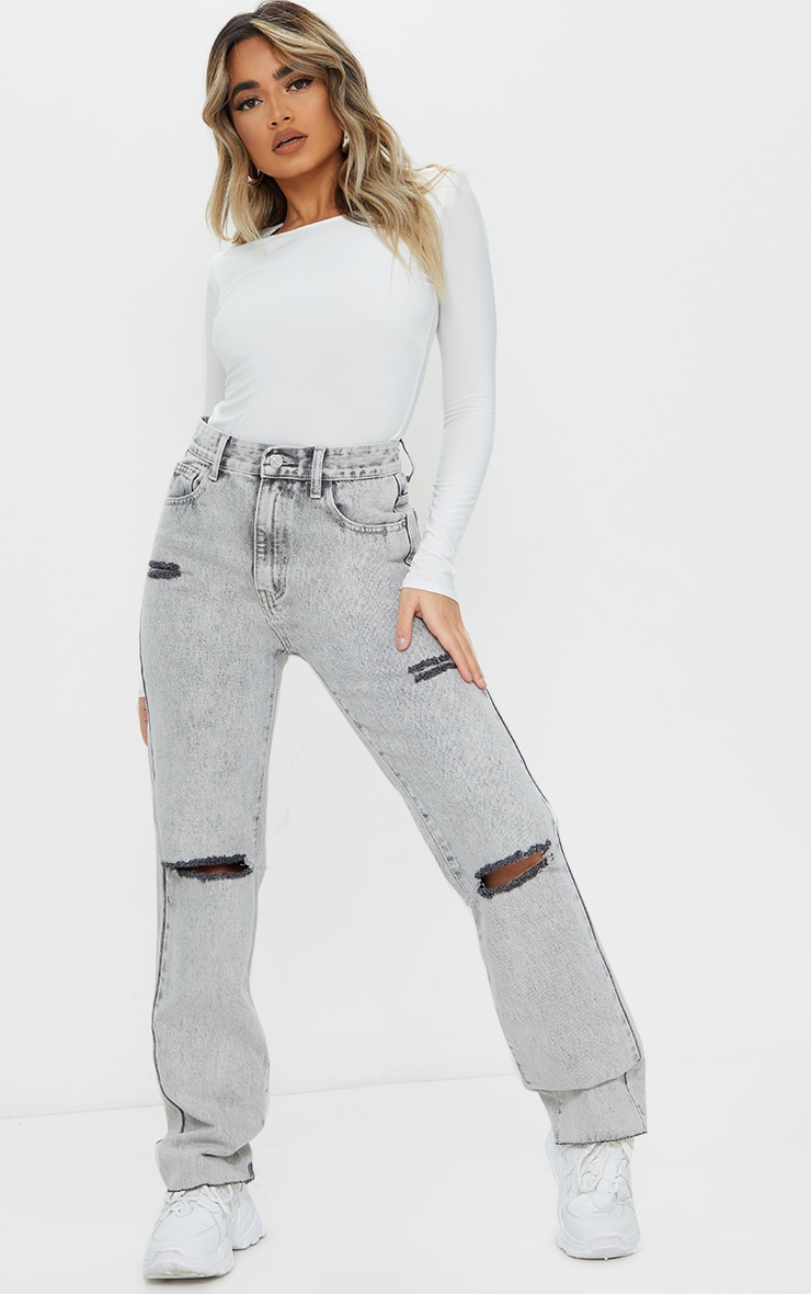 PRETTYLITTLETHING Petite - Jean long délavé gris effet javélisé à détail déchiré