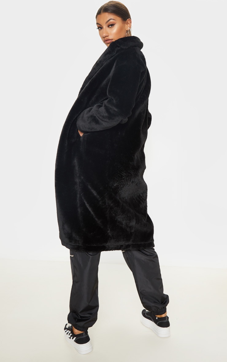 tall black faux fur coat