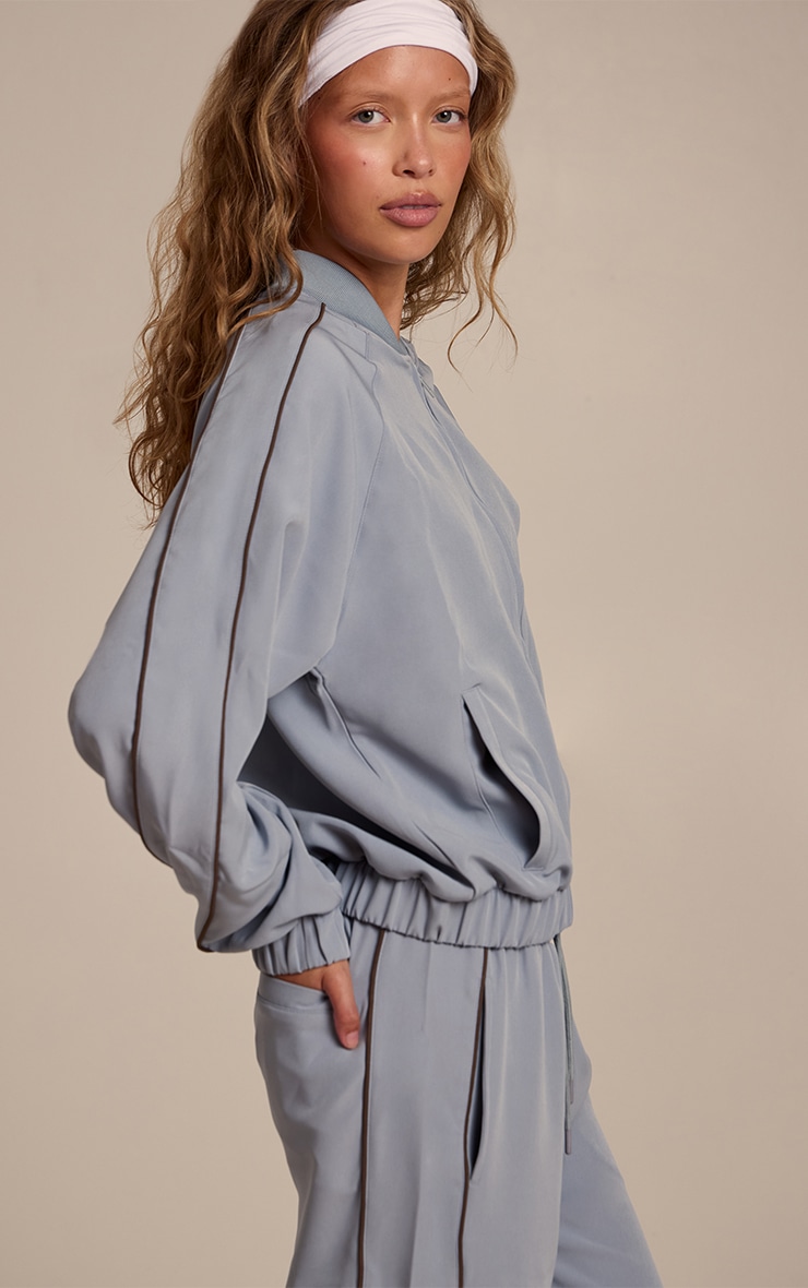 Veste bomber bleu clair à lisérés structurants tricotés image 4