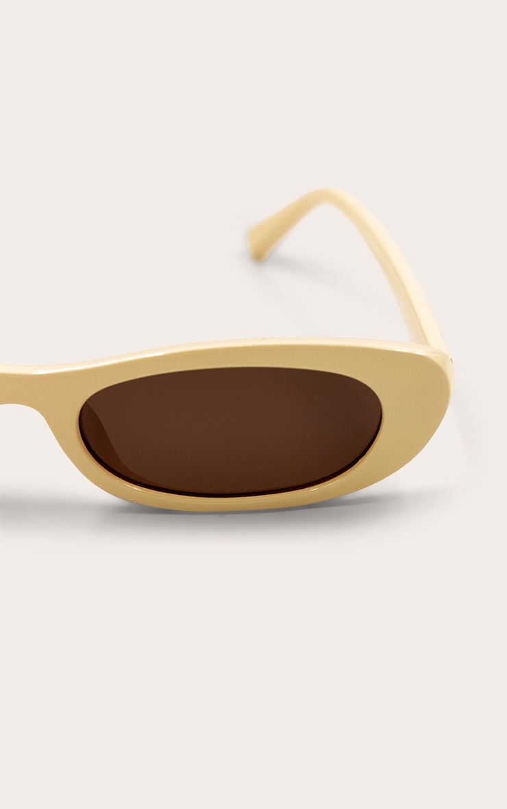 Lunettes de soleil style oeil de chat lisses jaune beurre image 4